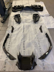 CARBON OEM GENUINE PARTS for FERRARI SF90 2021+  Set includes:  Front Lip Front Trims Side Skirts Side Vents Rear Diffuser Rear Spoiler Wing Material: Carbon Fiber  NOTE: Professional installation is required.  Contact us for pricing