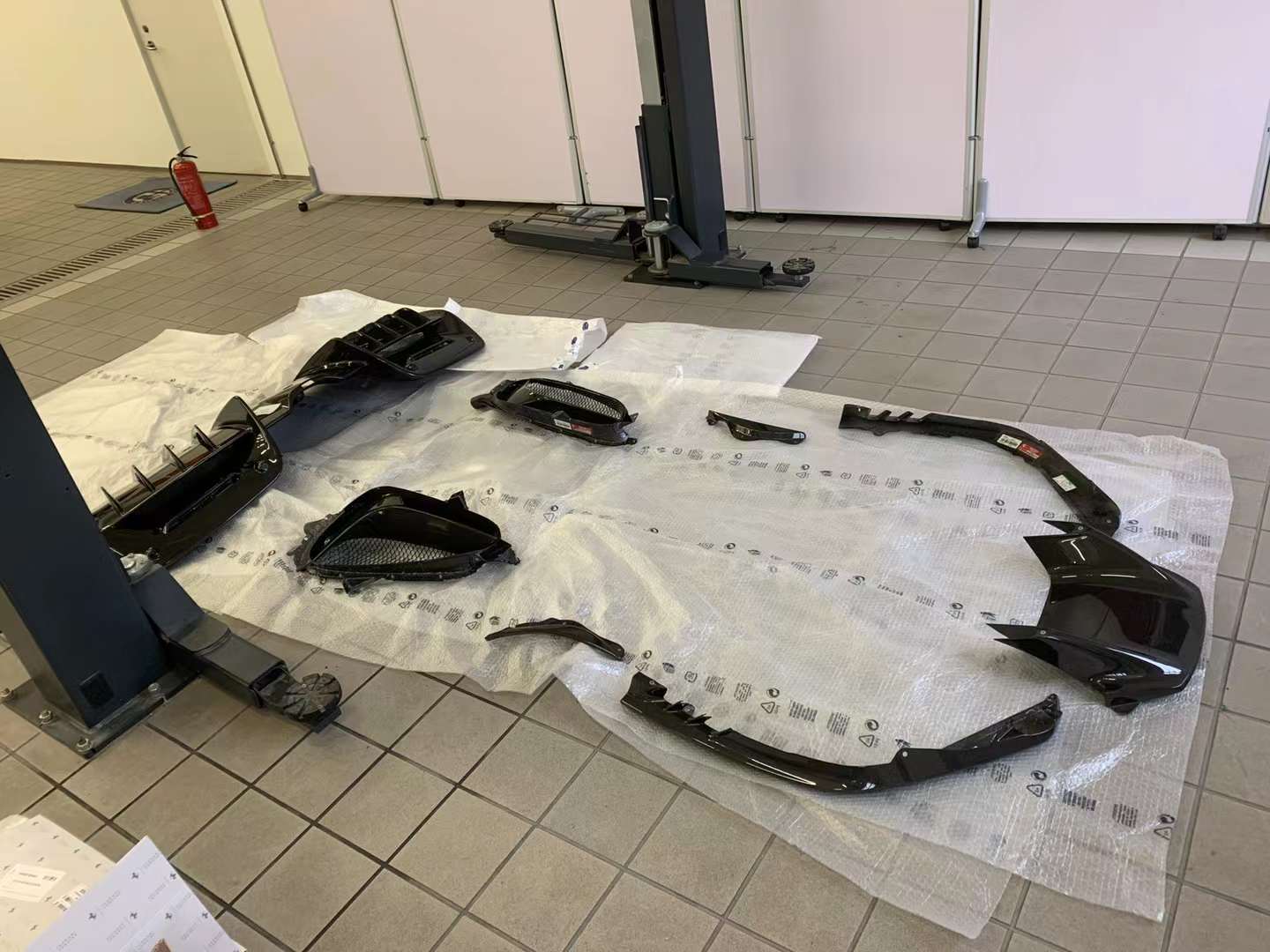 CARBON OEM GENUINE PARTS for FERRARI SF90 2021+  Set includes:  Front Lip Front Trims Side Skirts Side Vents Rear Diffuser Rear Spoiler Wing Material: Carbon Fiber  NOTE: Professional installation is required.  Contact us for pricing