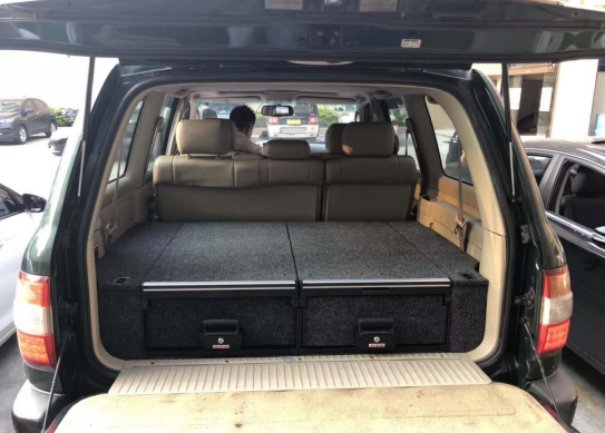 Slide Kitchen Drawer Systems For Land Cruiser 100 LC 100 by Forza Performance  Simplify the storage and organization of equipment and valuables. These lockable drawers with integrated deck and faceplates were designed specifically for the Toyota Land Cruiser 100. Hide the contents from prying eyes, while creating a more convenient and easily accessible storage space in your car. Designed solidly for tough for both on and off-road travel.