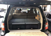 Slide Kitchen Drawer Systems For Land Cruiser 100 LC 100 by Forza Performance  Simplify the storage and organization of equipment and valuables. These lockable drawers with integrated deck and faceplates were designed specifically for the Toyota Land Cruiser 100. Hide the contents from prying eyes, while creating a more convenient and easily accessible storage space in your car. Designed solidly for tough for both on and off-road travel.
