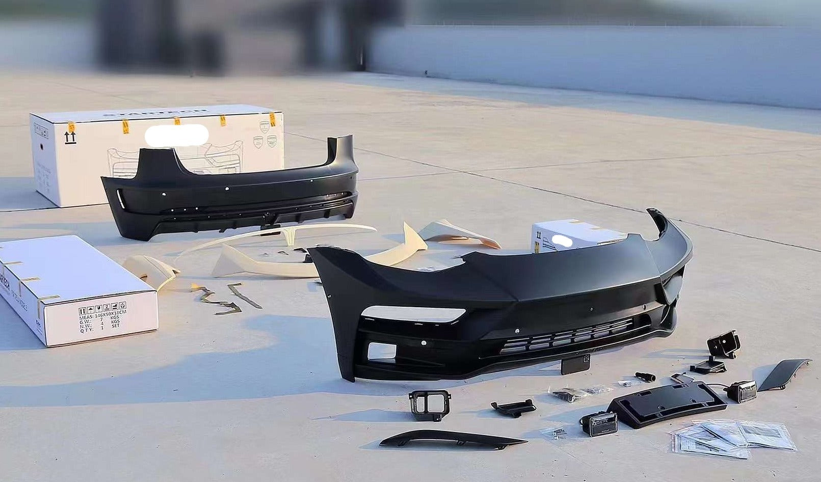 STARTECH Body Kit For Tesla Model Y  Set include:  Front Bumper Assembly Side Skirt Trims Rear Spoiler Rear Bumper Assembly Material: Plastic Note: Professional installation is required