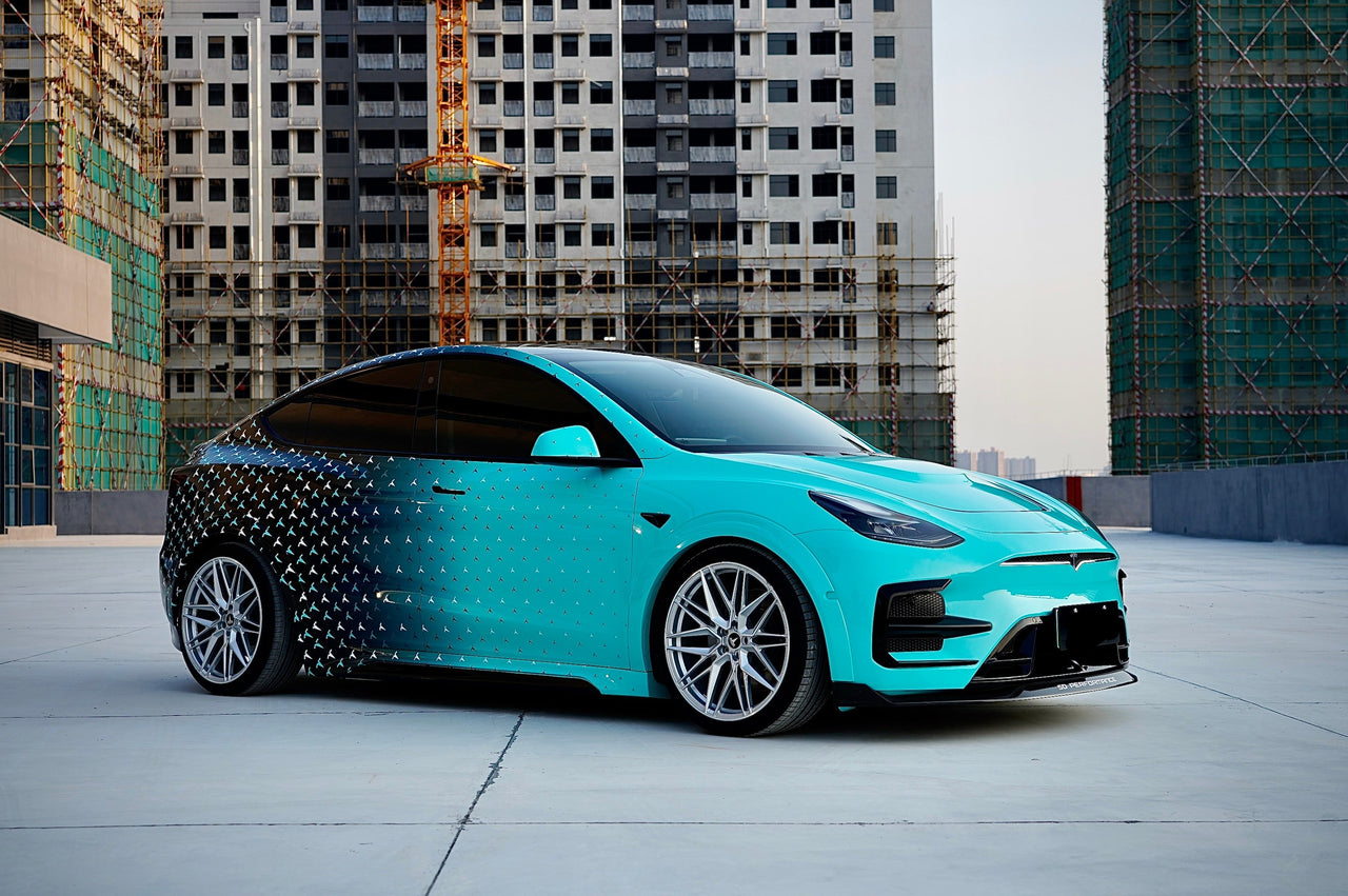 FORZA PERFORMANCE BODY KIT for TESLA Model Y Body Kit for Tesla Model Y  Set include:   Front bumper assembly with front lip Front hood Side skirts Wide fenders (can use without) Rear diffuser Trunk spoiler  Roof Spoiler Material: Carbon or PP