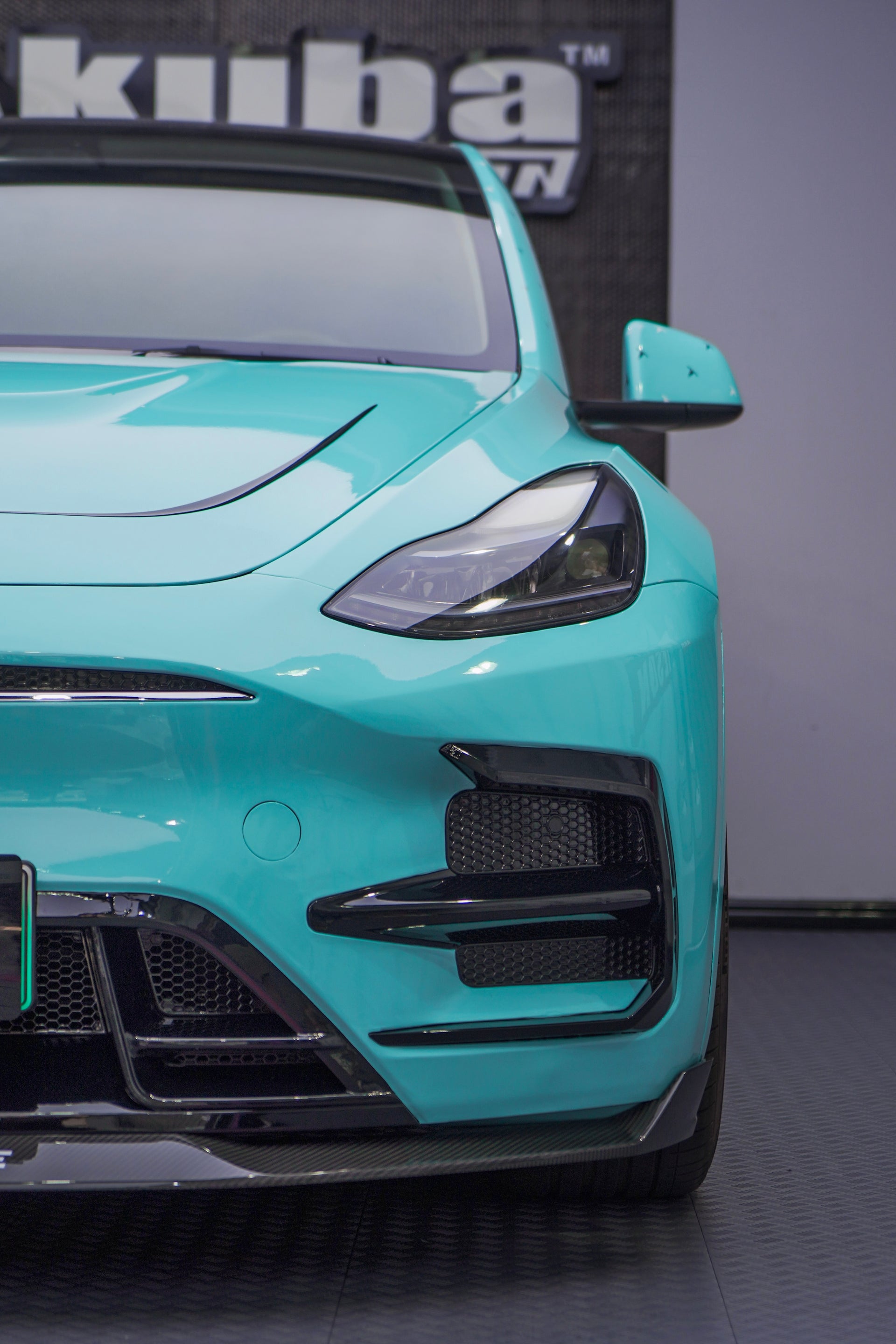 FORZA PERFORMANCE BODY KIT for TESLA Model Y Body Kit for Tesla Model Y  Set include:   Front bumper assembly with front lip Front hood Side skirts Wide fenders (can use without) Rear diffuser Trunk spoiler  Roof Spoiler Material: Carbon or PP
