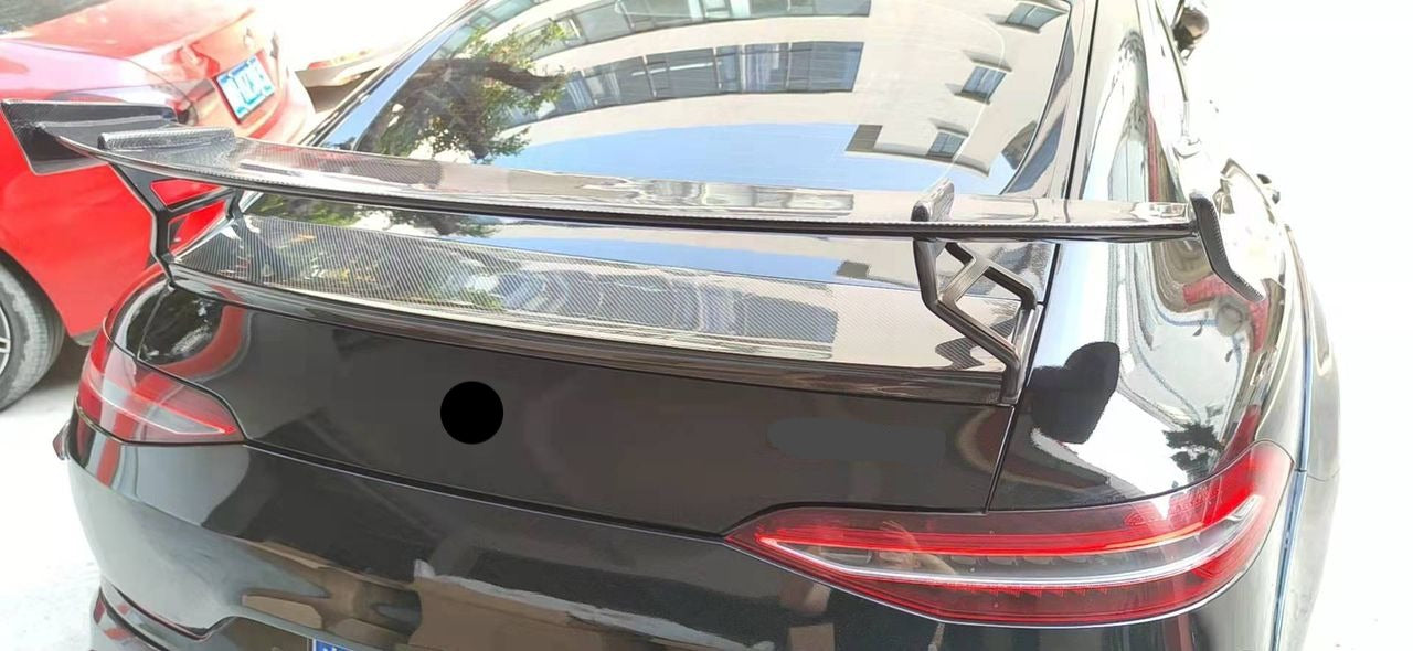 AMG GT ROCKET 900 AMG GT W290 Conversion Kit AMG GT 63   Set include:   New Front Bumper New Front trims New Side skirts New Side wide fenders New Rear Diffuser New Spoiler wing Material: Carbon fiber + fiberglas
