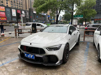 AMG GT ROCKET 900 AMG GT W290 Conversion Kit AMG GT 63   Set include:   New Front Bumper New Front trims New Side skirts New Side wide fenders New Rear Diffuser New Spoiler wing Material: Carbon fiber + fiberglas