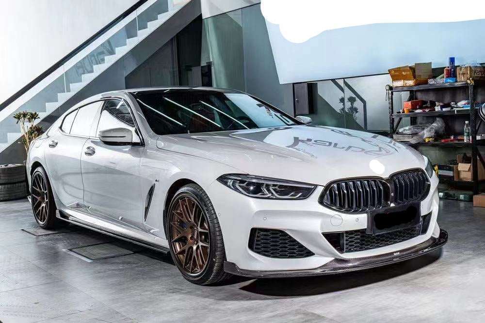 CARBON FIBER BODY KIT for BMW 8 SERIES G16 2019+

Set includes:

Front Lip
Side Skirts
Rear Diffuser
Rear Bumper Trims

Material: Real Carbon Fiber

NOTE: Professional installation is required.