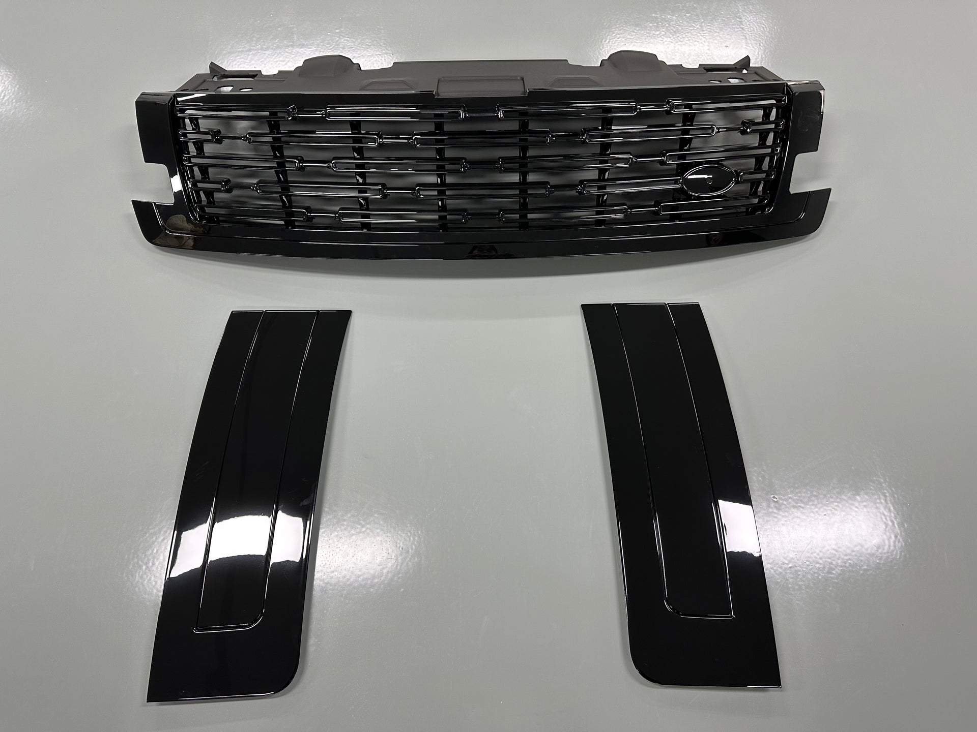 Black Trim Body Kit For New Land Rover Range Rover Vogue L460 2023  We were the first to create a body kit for the Land Rover Range Rover. The body kit is of consistently high quality. The body kit turned out to be elegant and not flashy, as it should be for a large and solid car.  Set include:  Front Grille Rear Diffuser Front Bumper Inserts Black Plaid Spoiler Material: Plastic Note: Professional installation is required