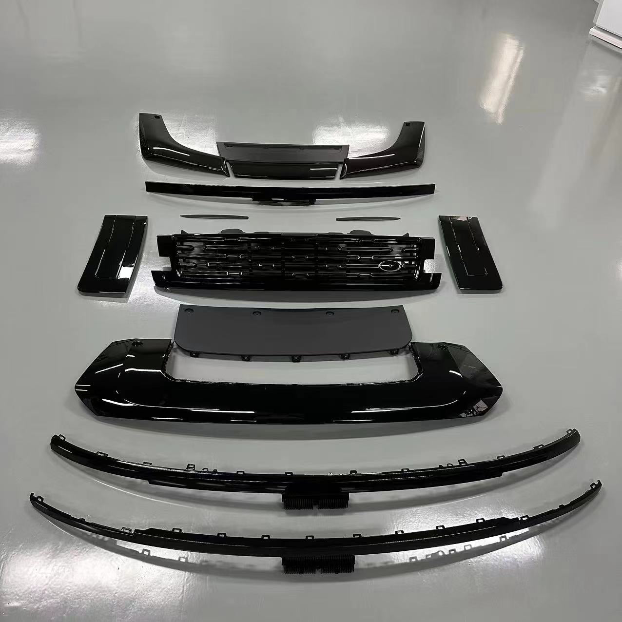 Black Trim Body Kit For New Land Rover Range Rover Vogue L460 2023  We were the first to create a body kit for the Land Rover Range Rover. The body kit is of consistently high quality. The body kit turned out to be elegant and not flashy, as it should be for a large and solid car.  Set include:  Front Grille Rear Diffuser Front Bumper Inserts Black Plaid Spoiler Material: Plastic Note: Professional installation is required