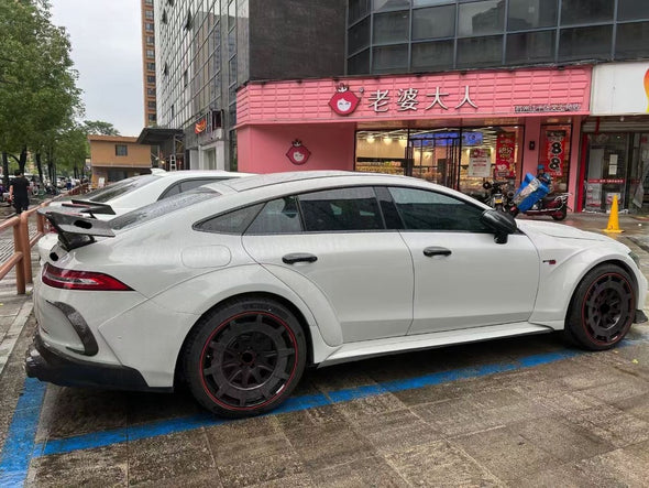 BRABUS AMG GT ROCKET 900 AMG GT W290 Conversion Kit AMG GT 63   Set include:   New Front Bumper New Front trims New Side skirts New Side wide fenders New Rear Diffuser New Spoiler wing Material: Carbon fiber + fiberglas