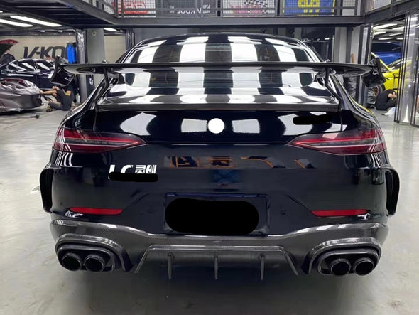 BRABUS AMG GT ROCKET 900 AMG GT W290 Conversion Kit AMG GT 63   Set include:   New Front Bumper New Front trims New Side skirts New Side wide fenders New Rear Diffuser New Spoiler wing Material: Carbon fiber + fiberglas