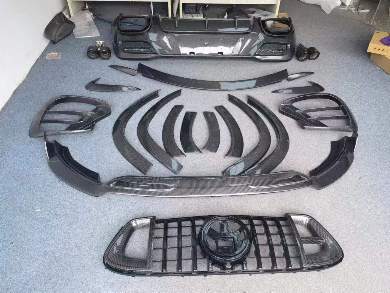 BRABUS Carbon Body Kit For Mercedes Benz AMG GLE 63 Coupe C167  Set include:    Front Grille Front Lip Fenders Add-On Rear Diffuser Front Bumper Vents Trunk Spoiler Rear Fascia inserts Exhaust Tips Material: Real Carbon