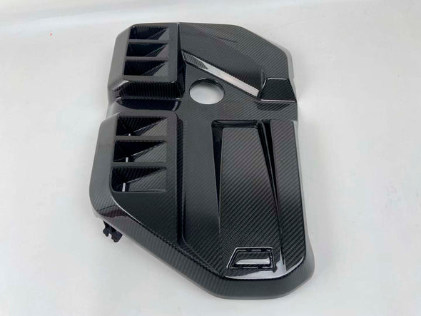 CARBON FIBER ENGINE COVER KIT for BMW G8X M2 M3 M4 2020+

Set includes:

Engine Cover
Intake
Strut Brace / Bar

Material: Carbon Fiber