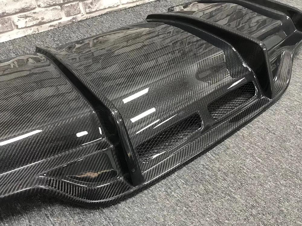 CARBON REAR DIFFUSER for MERCEDES BENZ C CLASS AMG W205 C63 2015 - 2022

Set includes:

Rear Diffuser

Material: Carbon Fiber

Note: Professional installation is required
