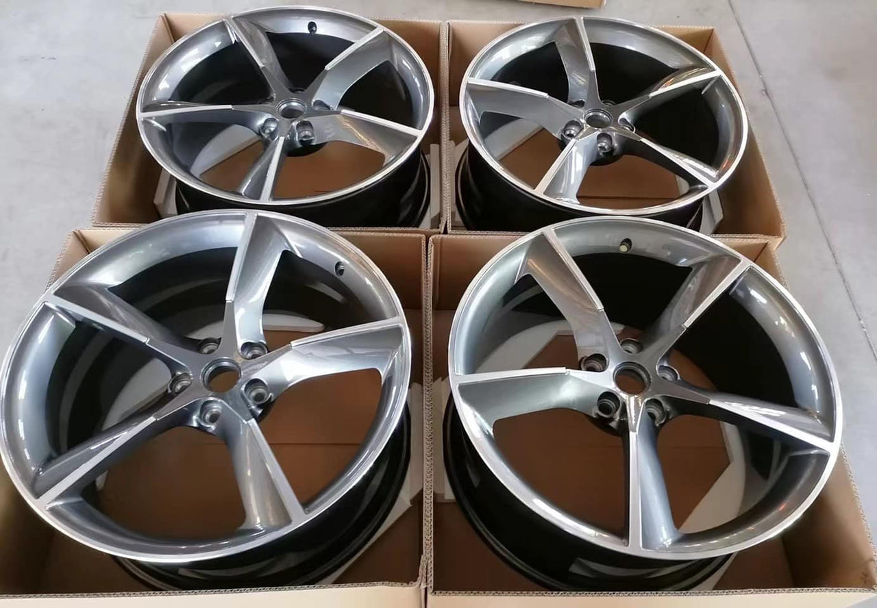 We produced premium quality forged wheels rims for  FERRARI ROMA  Our wheels sizes:   Front 21 x 9 ET 34  Rear 22 x 11.5 ET 39  Finishing: Gunmetal  Forged wheels can be produced in any wheel specs by your inquiries and we can provide our specs