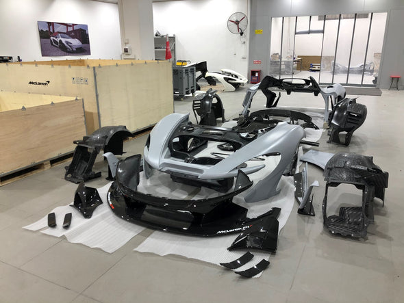 Conversion Dry Carbon Body Kit For McLaren P1 2013-2016 to P1 GTR  Set Include:  Front Lip Front Bumper OEM Part Fron Bumper Air Intake Cover Side Skirts Side Air Intake Cover Rear Diffuser Rear Diffuser Trims Rear Spoiler (2 types) Trunk/Hood Lid Panel Entrance Material: Dry Carbon  CONTACT US FOR PRICING  Note: Professional installation is required. 