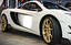 DMC Dry Carbon Body Kit For McLaren MP4-12C  Set include:  Front Bumper Front Lip Front Bumper Side Canards Side Skirts Roof Scoop Air Tunnel Rear Diffuser Rear Spoiler/Wing Material: Dry Carbon  Note: Professional installation is required