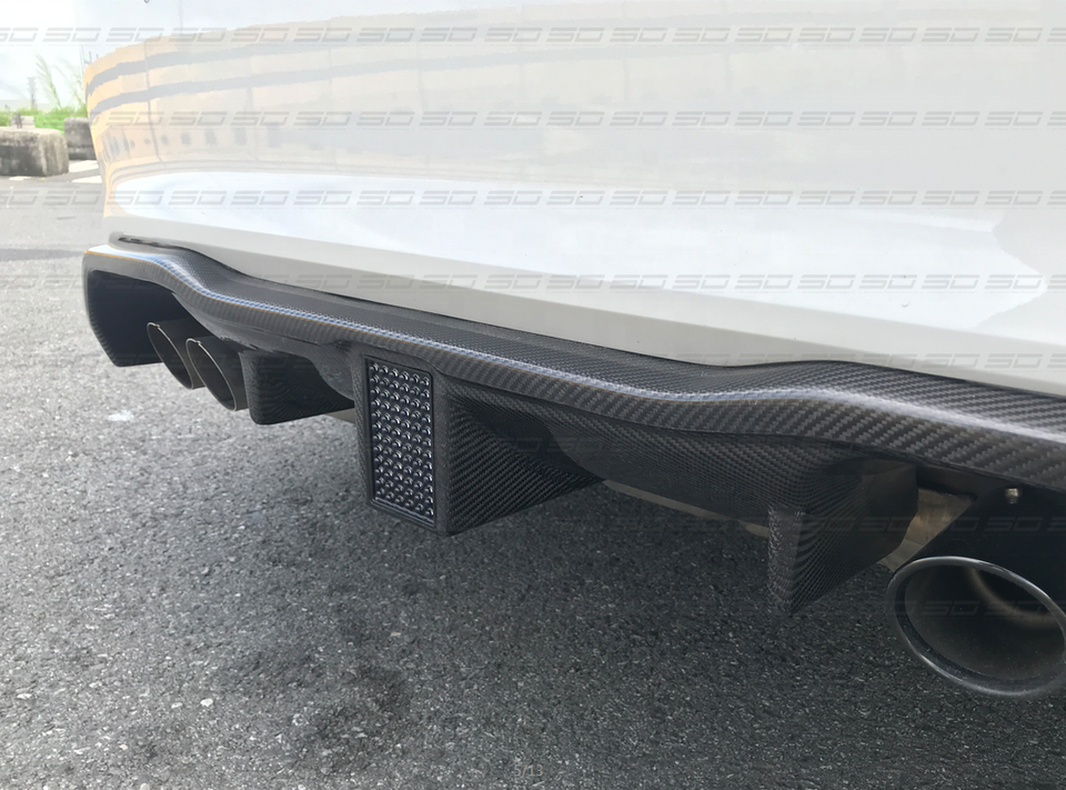 K Style Dry Carbon Rear Diffuser With LED Light For BMW M2 F87  Set Include:  Rear Diffuser With LED Light Material: Dry Carbon  NOTE: Professional installation is required.