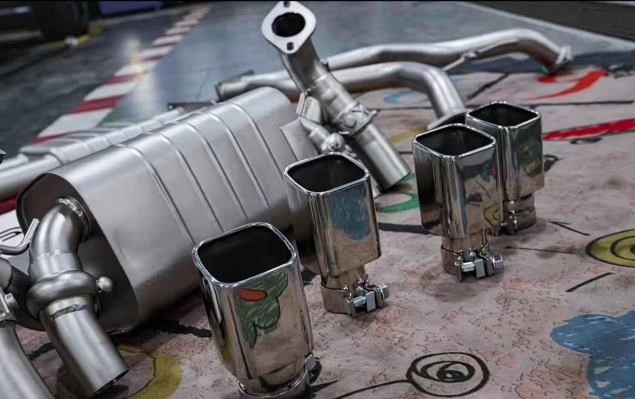 Exhaust System For Land Rover Defender 3.0 L663 110  Valved exhaust, meaning that has remote, controlled valves - allowing a switch between an aggressive loud sports sound and a sound that is closer to the OEM sound  Set include:  Front pipe Mufflers with valve Exhaust tips Factory exhaust tips must be reused  Material: Stainless steel 304 ( for an extra cost we can make titanium )  Optional: We can offer downpipe and catless downpipe