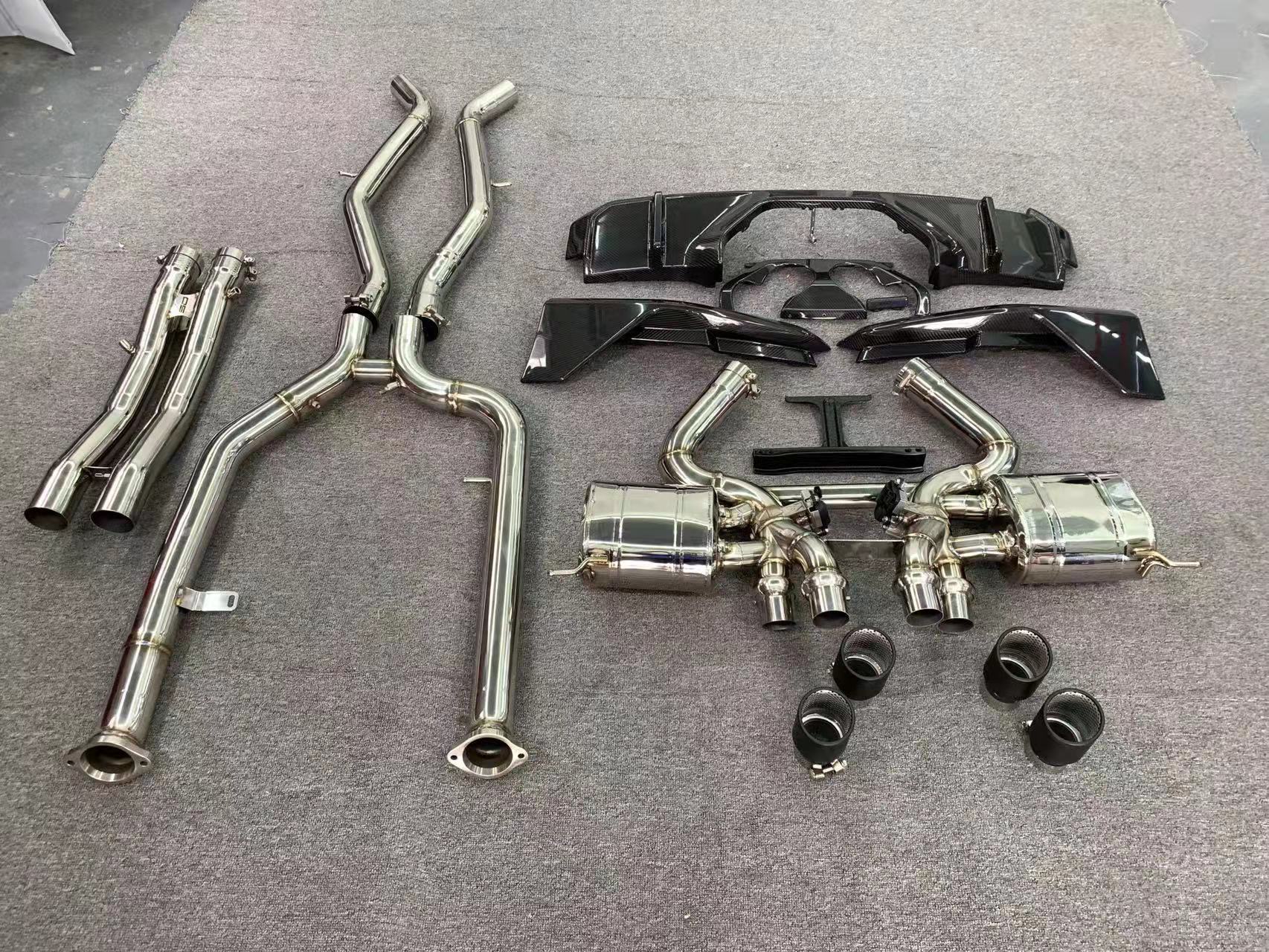 Aggressive sporty sound VALVED EXHAUST CATBACK MUFFLER with exhaust tips for BMW M3 G80 M4 G82 2021+ (Engine:3.0)  Valved exhaust, meaning that has remote, controlled valves - allowing a switch between an aggressive loud sports sound and a sound that is closer to the OEM sound  Set include:   Front pipes Center pipes Mufflers with valves Exhaust tips Material: Stainless steel 304