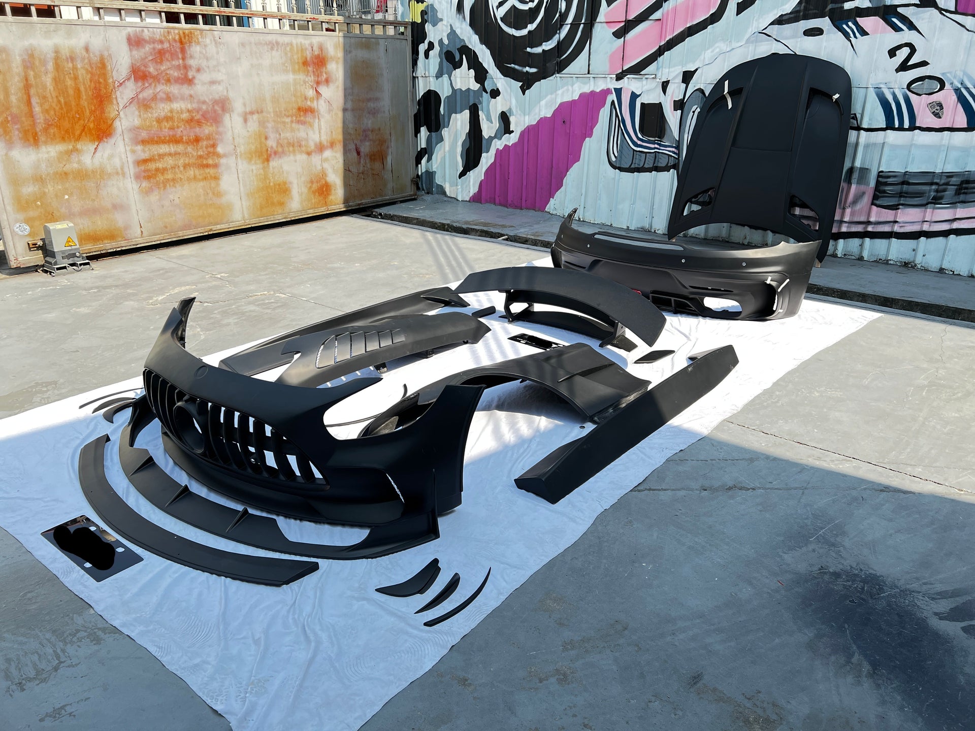 Black Series Body Kit For Mercedes Benz AMG GT Coupe 2014-2017  Set include:  Grille  Front Bumper Front Lip  Canards Fenders Side Skirts Hood Spoiler Rear Bumper Material: FiberGlass  Note: Professional installation is required