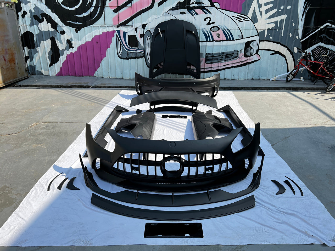 Black Series Body Kit For Mercedes Benz AMG GT Coupe 2014-2017  Set include:  Grille  Front Bumper Front Lip  Canards Fenders Side Skirts Hood Spoiler Rear Bumper Material: FiberGlass  Note: Professional installation is required