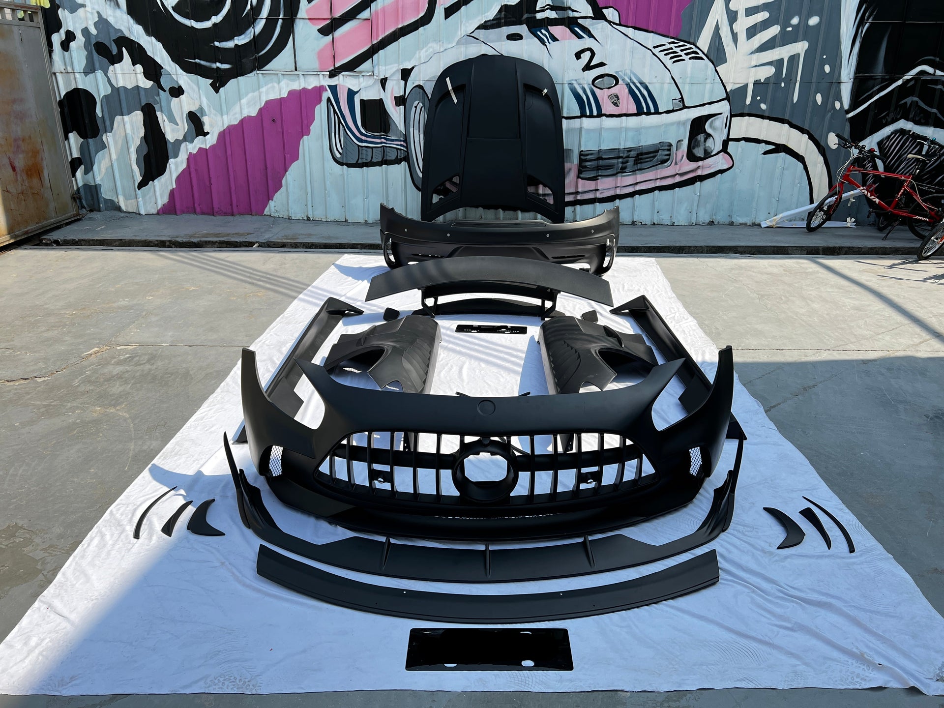 Black Series Body Kit For Mercedes Benz AMG GT Coupe 2014-2017  Set include:  Grille  Front Bumper Front Lip  Canards Fenders Side Skirts Hood Spoiler Rear Bumper Material: FiberGlass  Note: Professional installation is required
