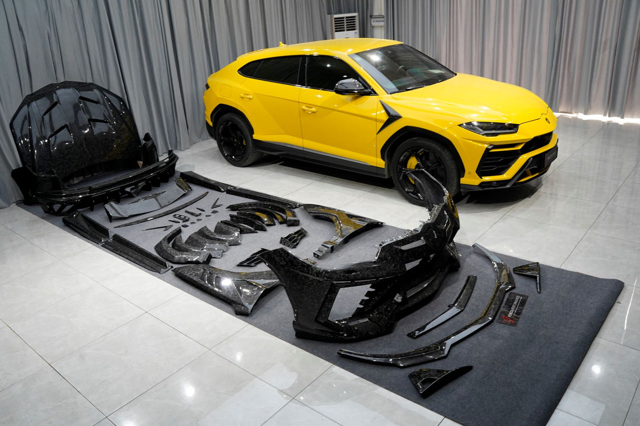 Forged Carbon Wide Body Kit For Lamborghini Urus 2017+
Set includes:
Front Bumper
Front Lip
Front Bumper Air Intakes
Front Bumper Air Intakes Lamels
Rear Bumper With Middle Exhaust
Rear Diffuser
Rear Bumper Air Outtake
Exhaust Tips
Hood/Bonnet
Air Outtake For Engine Hood/Bonnet
Front Fenders
Air Vent Tail Light
Mirror Covers
Race Flaps
Roof Spoiler
Trunk Spoiler
Rear Spoiler
Rear Decklid Spoiler
Engine Cover
Material: FULL FORGED CARBON
Note: Professional installation is required
CONTACT US FOR PRICING