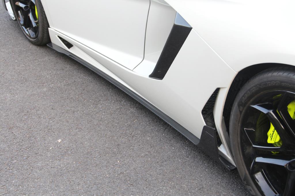 DMC Carbon Side Skirts For Lamborghini Aventador LP700  Set include:   Side Skirts Material: Real Carbon Fiber  CONTACT US FOR PRICING
