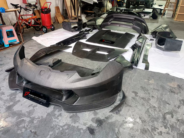 Carbon replacement BODY KIT for Lamborghini Huracan LP 620-2 2013 - 2016 Set include: Front bumper Front lip Front hood Side skirts Rear bumper Rear diffuser Rear Spoiler Material: DRY CARBON FIBER