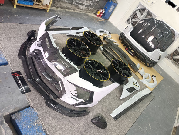 Carbon Wide Body Kit For Lamborghini Urus With Forged Wheels

Set includes:

Front Bumper Assembly

Front Lip
Hood/Bonnet
Mirror Covers

Side Fenders
Side Fender Vents
Side Skirts
Rear Bumper Assembly
Rear Diffuser
Trank Spoiler
Spoiler/Wing

Material: Carbon

Note: Professional installation is required

CONTACT US FOR PRICING

Payment ►
Visa
Mastercard
PayPal with a credit card (add 4.4% at checkout)
Payoneer
Cryptocurrency
Shipment ►
By express DHL/UPS/TNT/FedEx
To the local international airport
Special 