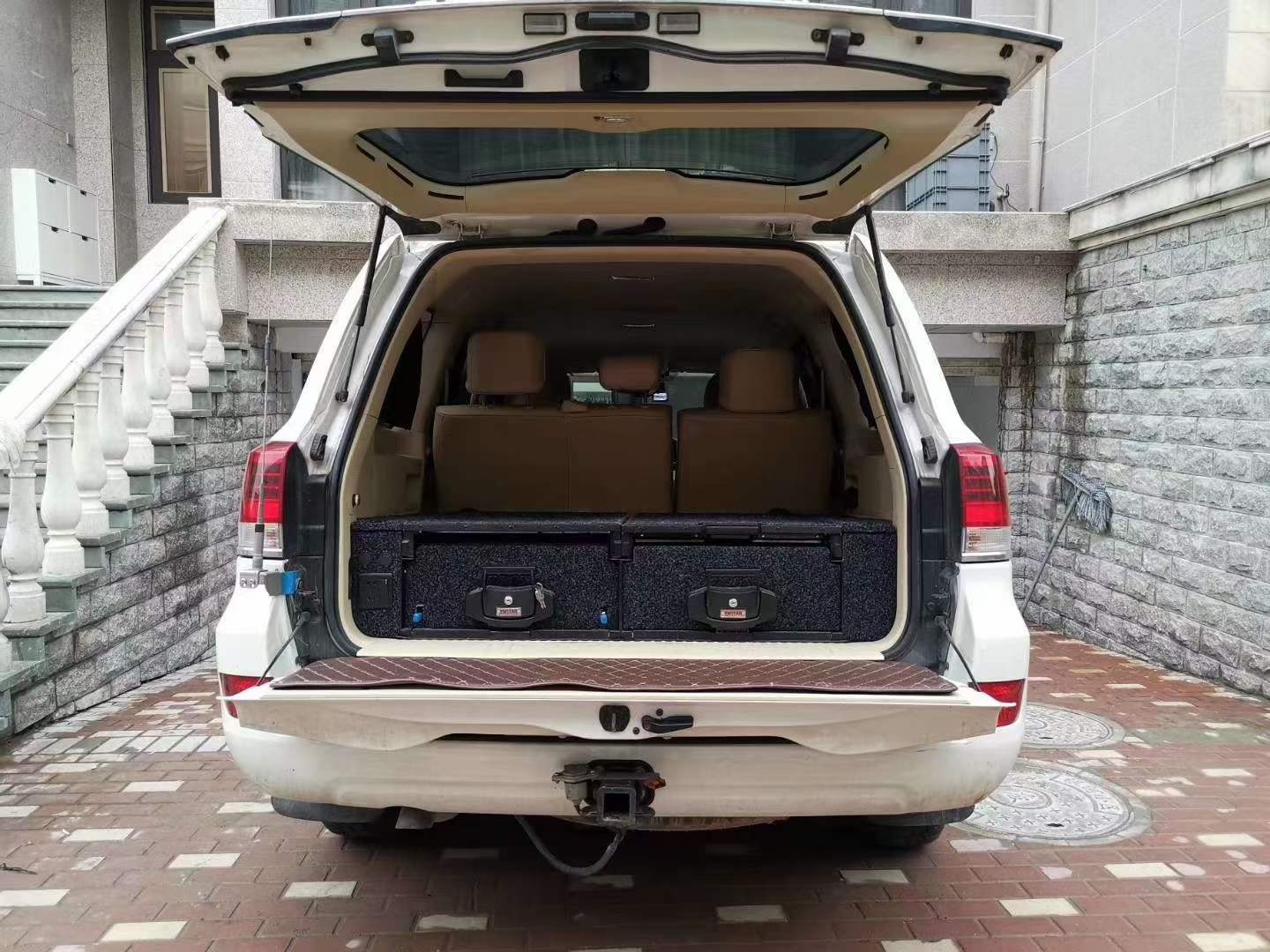 Deployable Slide Drawer Systems For Land Cruiser 200 LC200easily accessible storage space in your car. Designed solidly for tough for both on and off-road travel.  Measurements: Fixed 1000*530*275mm / Roller 1000*530*275/150mm  Which drawers are best for me?  We have a turnkey solution and you are able to modify the whole drawers system with:  - Sink faucet  - Kitchen   - Barrier  - Slide floor  - Table Board / Cutting board  - Fridge 