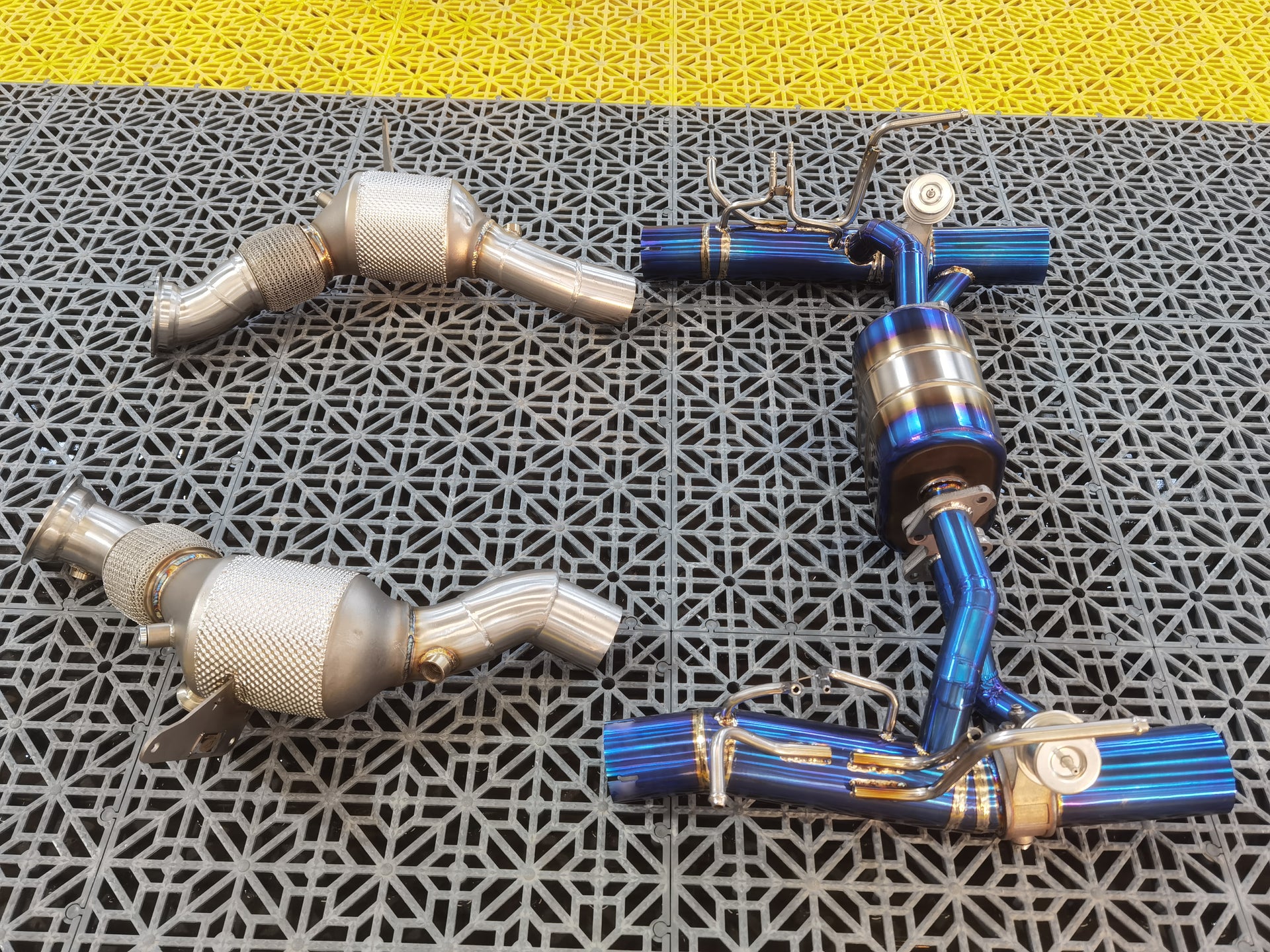 Aggressive Sporty Sound Valved Exhaust System with Mufflers for Ferrari F8 Tributo 2019 - 2023 (3.9)  Set include:  Mufflers - Catback Valves Downpipes Material: Stainless steel ( for an extra cost we can make titanium )  Optional: We can offer downpipe and catless downpipe   Production time: 20-25 days