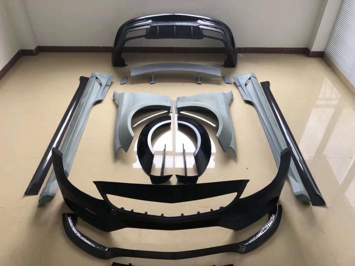 WIDE BODY KIT for MERCEDES BENZ C CLASS W205 C63 2015 - 2021

Set includes:

Front Bumper
Front Lip
Side Skirts
Fender Flares
Rear Bumper
Rear Spoiler

Material: Carbon Fiber

Note: Only fits the original C63. Professional installation is required